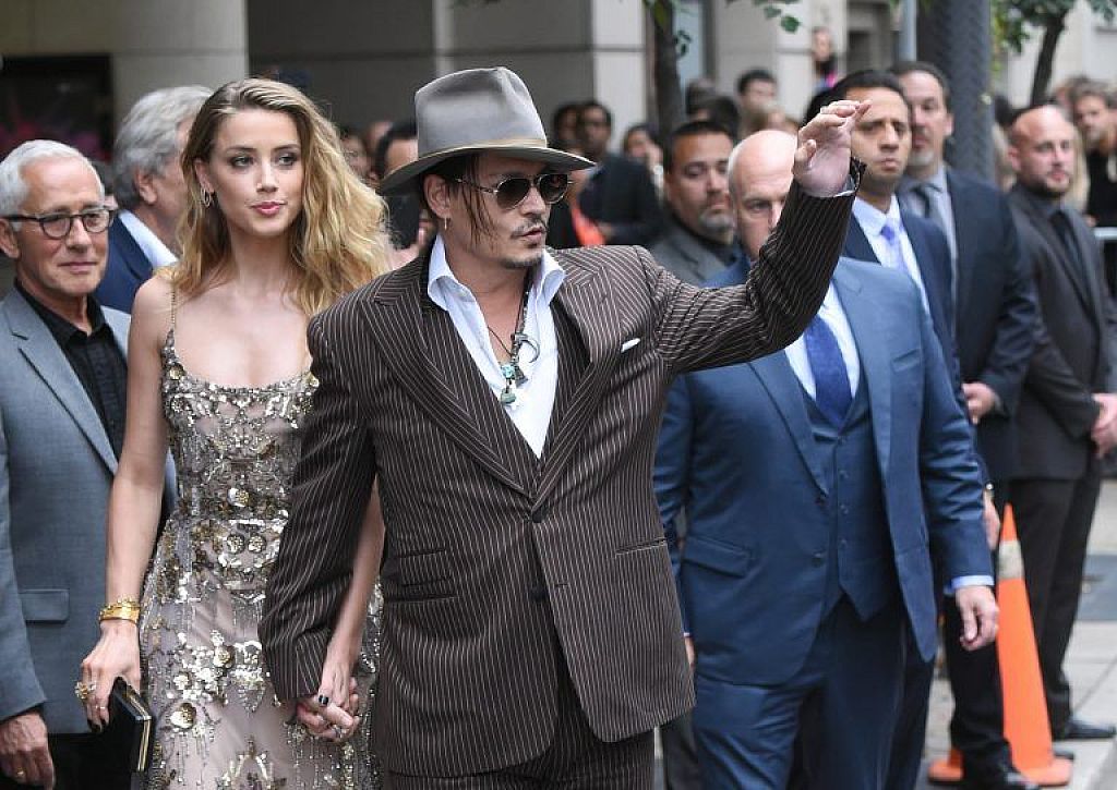 Amber Heard und Johnny Depp. © VAN AGOSTINI/INVISION/AP