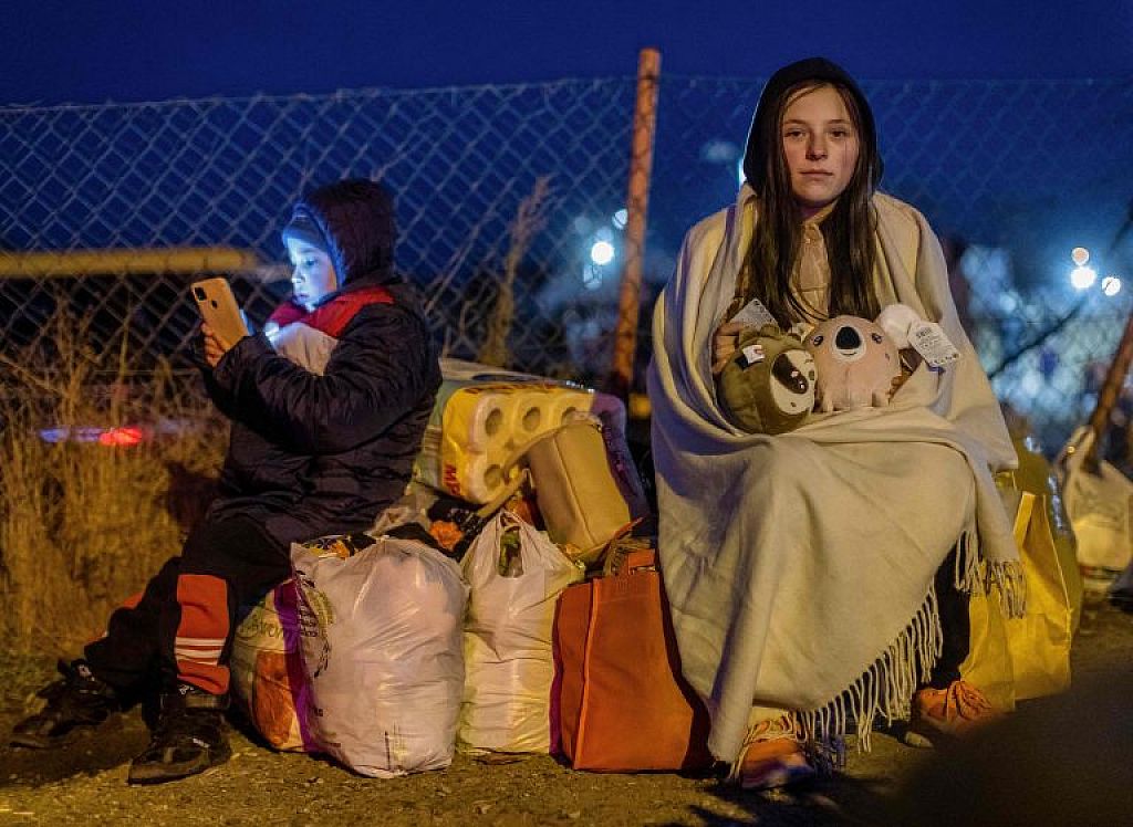 TOPSHOT-POLAND-UKRAINE-RUSSIA-CONFLICT-REFUGEES
 © Ukrainer fliehen nach Polen