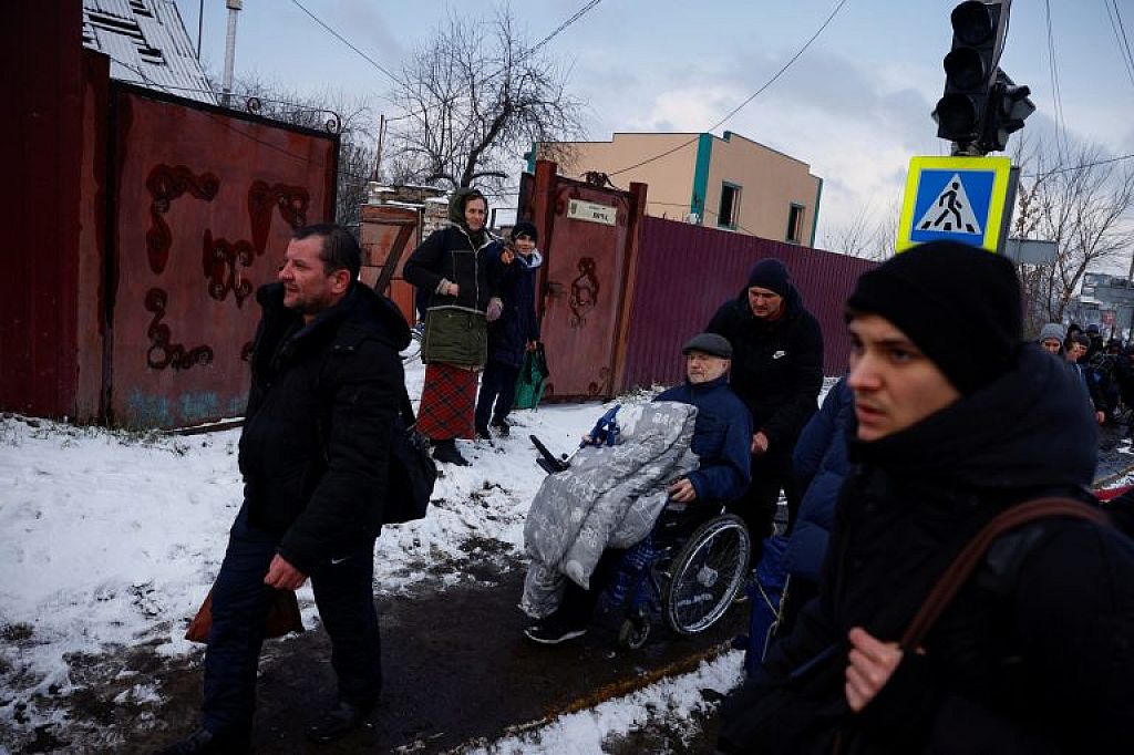 UKRAINE-CRISIS/
 © Sergei SUPINSKY/AFP AND REUTERS/Thomas Peter