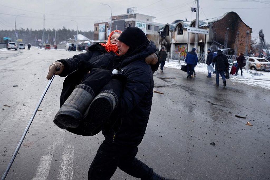 UKRAINE-CRISIS/
 © Sergei SUPINSKY/AFP AND REUTERS/Thomas Peter