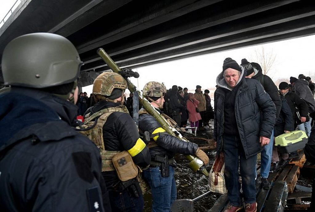 UKRAINE-RUSSIA-CONFLICT
 © Sergei SUPINSKY/AFP AND REUTERS/Thomas Peter