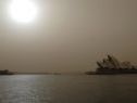 Trotz Sonne ist es finster über der Oper in Sydney Trotz Sonne ist es finster über der Oper in Sydney