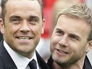 Robbie Williams und Gary Barlow singen ein Duett.