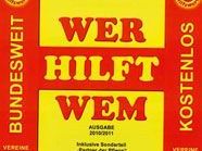 Plakate mit dem Schriftzug "Wer hilft wen" zieren ganz Wien