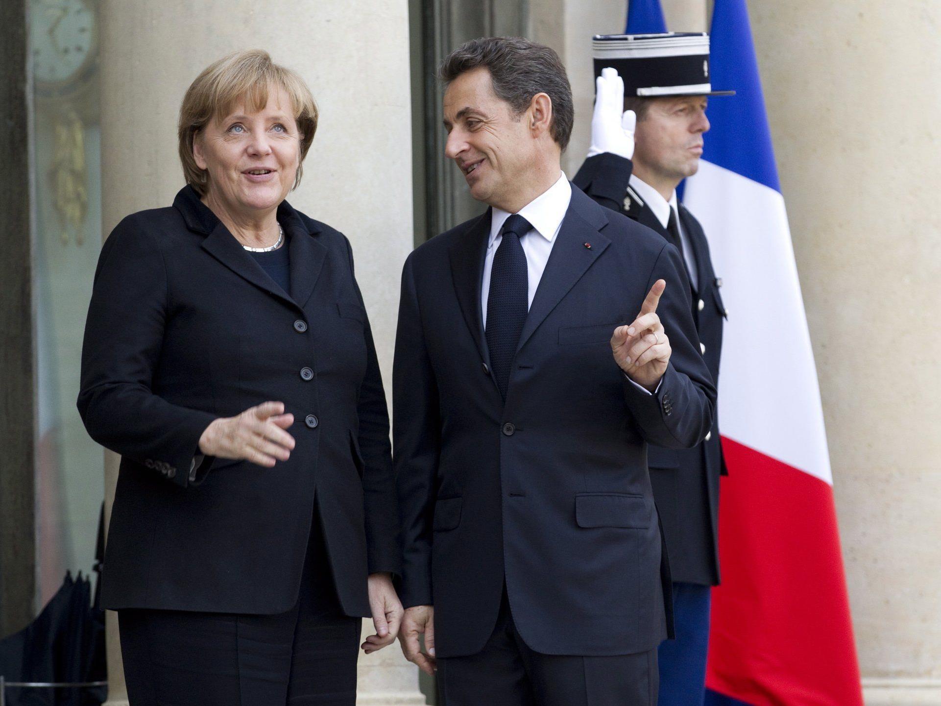 Merkel und Sarkozy zeigen, wo's lang geht.