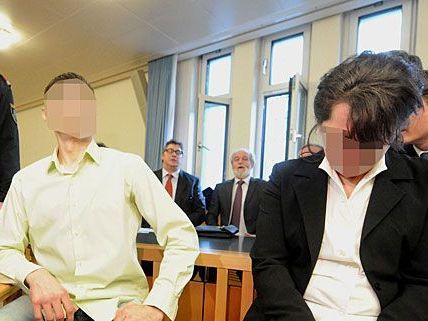 Die Witwe des Opfers und ihr Cousin sitzen beim Lagerhallen-Mord-Prozess auf der Anklagebank