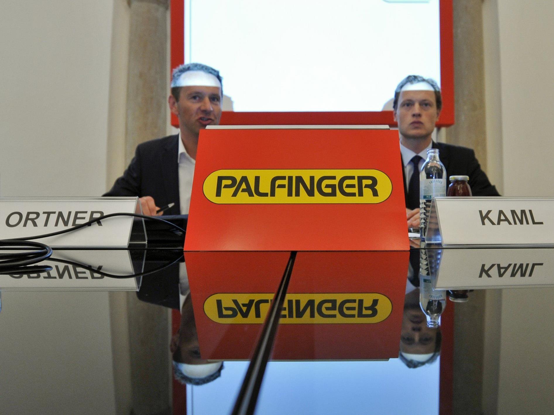 Palfinger AG Vorstandsvorsitzender Herbert Ortner (l.) und Finanzvorstand Christoph Kaml haben Grund zur Freude.