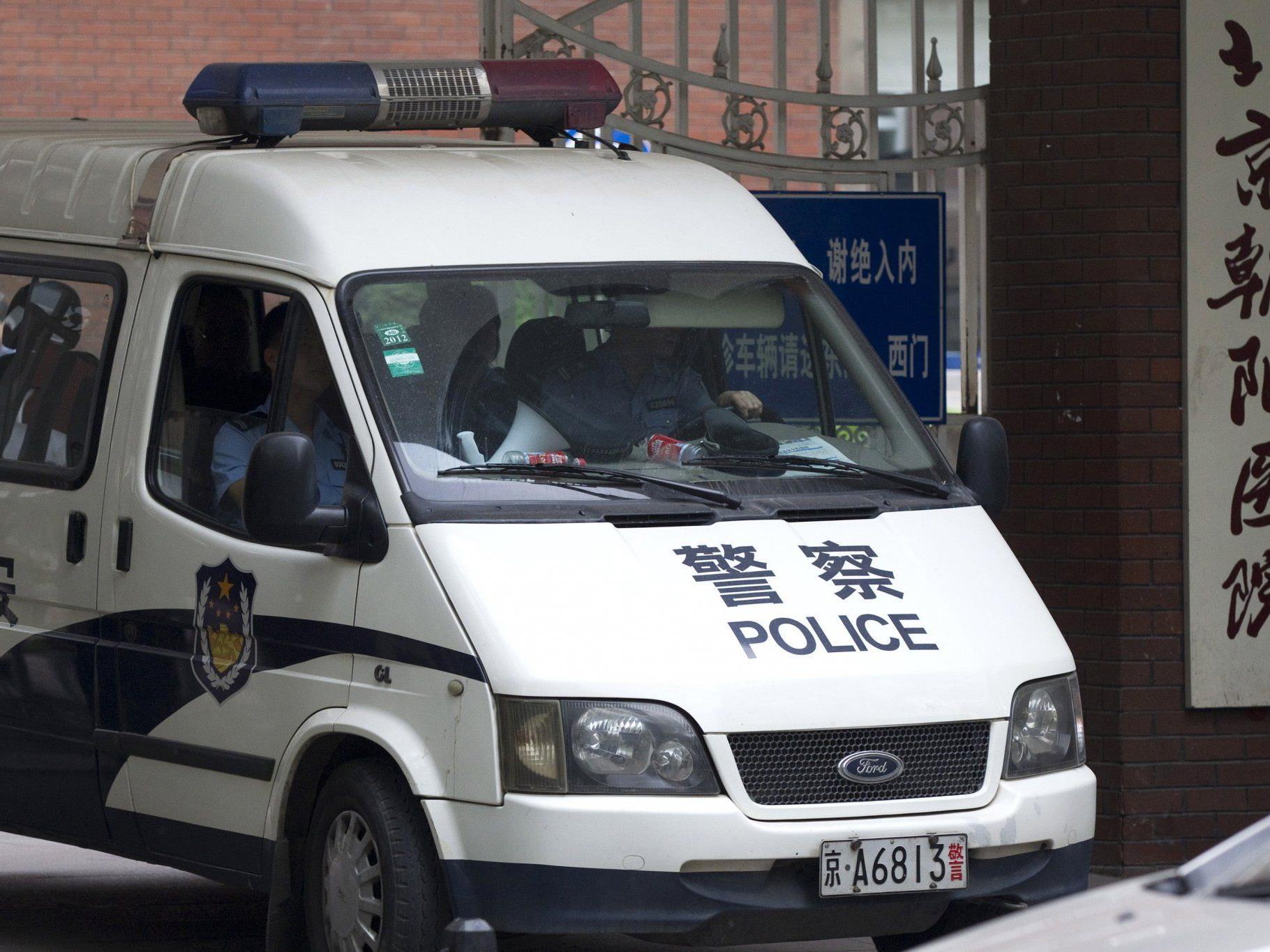 Die Polizei in China nahm einen mutmasslichen Kannibalen fest. - © AP / Symbolbild