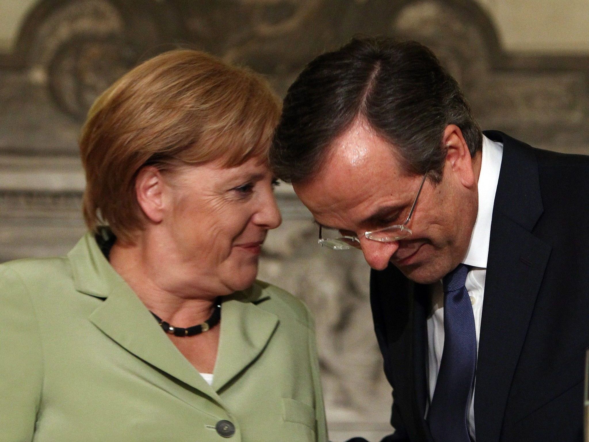Die deutsche Bundeskanzlerin Angela Merkel und der griechische Ministerpräsident Andonis Samaras. Die deutsche Bundeskanzlerin Angela Merkel und der griechische Ministerpräsident Andonis Samaras.