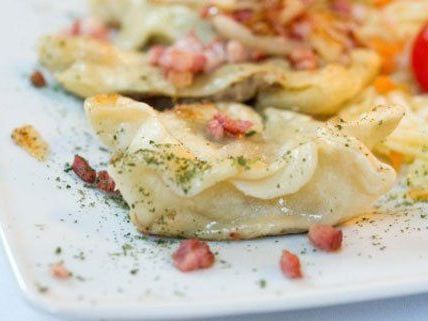 Die kleinen Teigtaschen Pierogi gelten als besondere Leckerbissen und Sattmacher. Die kleinen Teigtaschen Pierogi gelten als besondere Leckerbissen und Sattmacher.