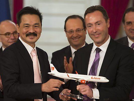Lion-Air-Chef Kirana (l.) mit Hollande und Bregier