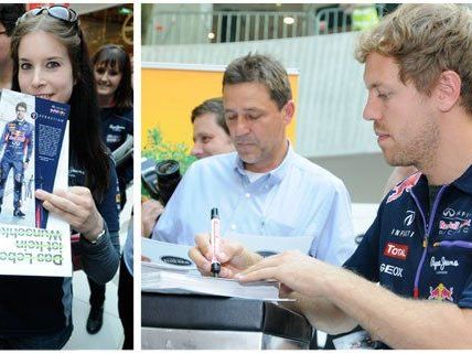 Sebastian Vettel und Daniel Ricciardo gaben eine Autogrammstunde. Sebastian Vettel und Daniel Ricciardo gaben eine Autogrammstunde.