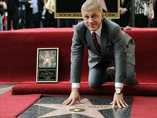 Ein stolzer Christoph Waltz mit seinem neu enthüllten Stern am Walk of Fame