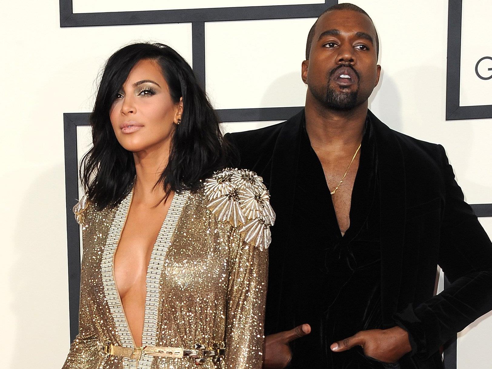 Kim Kardashian und ihr Ehemann Kanye West am roten Teppich.