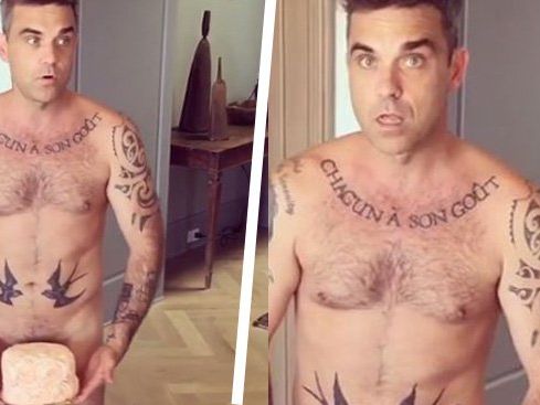 Robbie Williams serviert Torte im Adamskostüm. Robbie Williams serviert Torte im Adamskostüm.