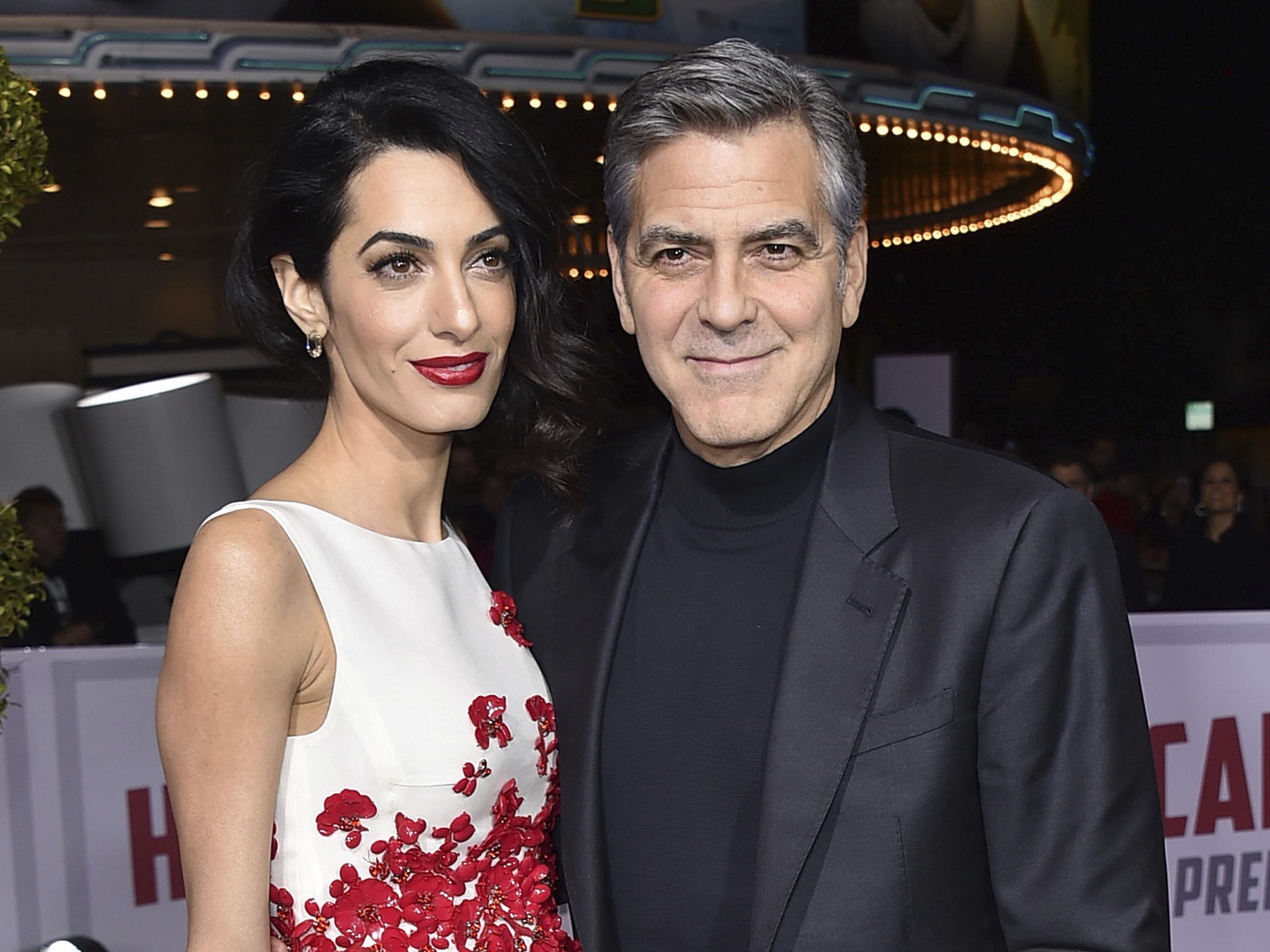 George Clooney und seine Frau Amal erwarten Medienberichten zufolge Zwillinge.
