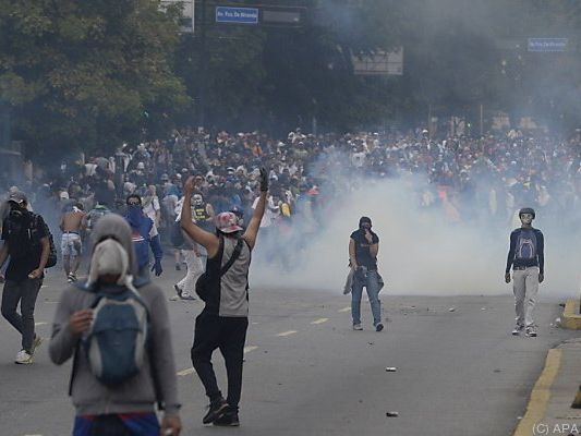 Wilde Szenen in den Straßen von Caracas Wilde Szenen in den Straßen von Caracas